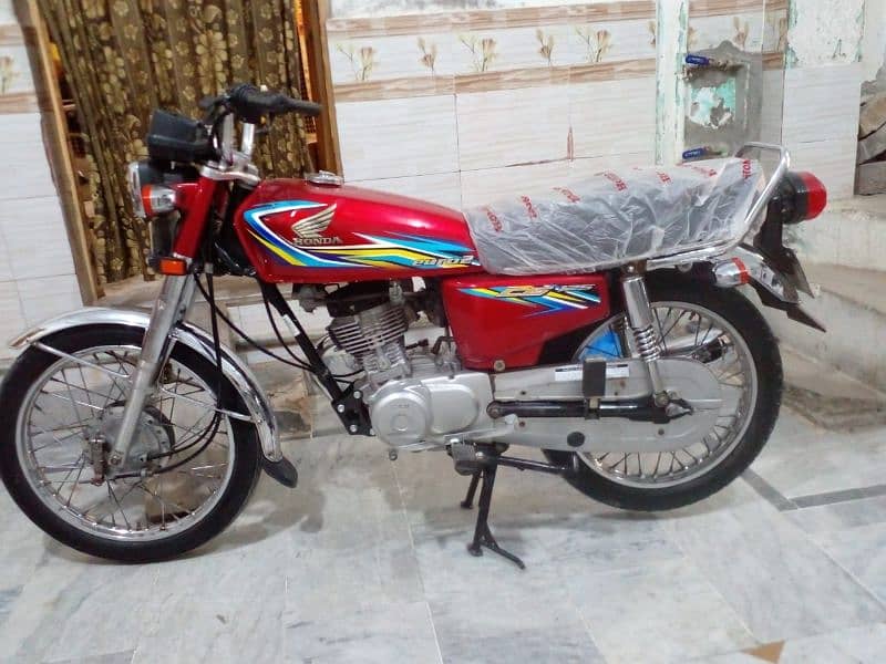 Honda 125 for urgent sale 2018 lahore number 1