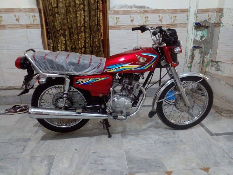 Honda 125 for urgent sale 2018 lahore number 5