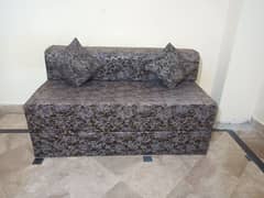 velvet sofa cum bed with 2 cushions