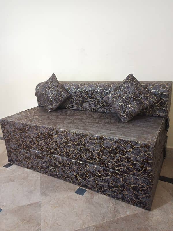 velvet sofa cum bed with 2 cushions 1