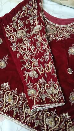 Red velvet bridal dress for sale in good condition.