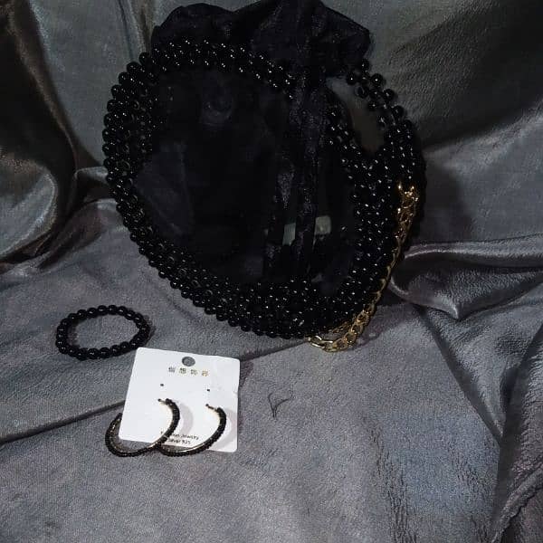 acrylic circle jet black beaded bags 0