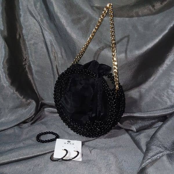 acrylic circle jet black beaded bags 1