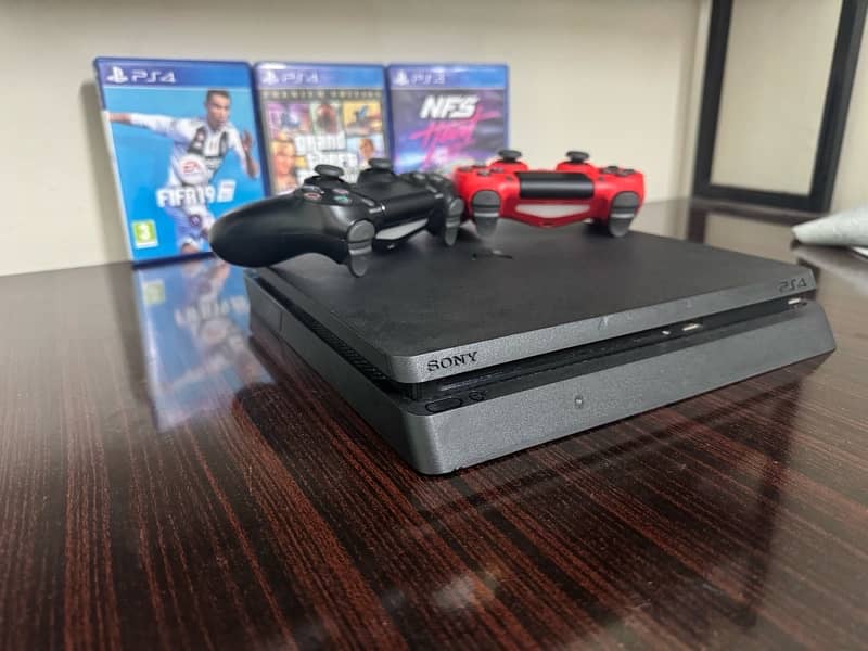 PS4 SLIM 1Tb with 2 orignal controllers And with all the cables needed 11