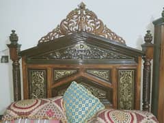 Wooden bed with side tables and dressing