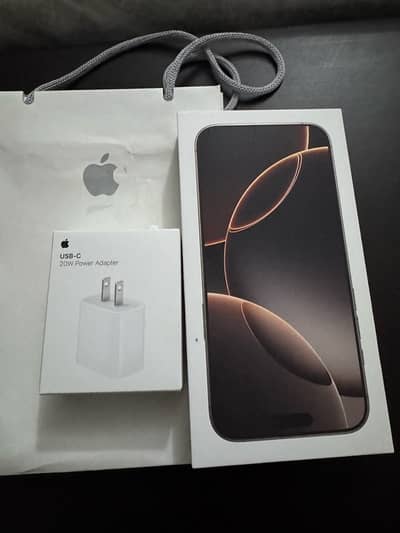 Apple IPhone 16 Pro max desert with original charger receipt