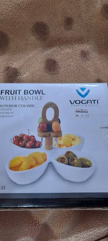 fruit bowl new. with wooden handle 0