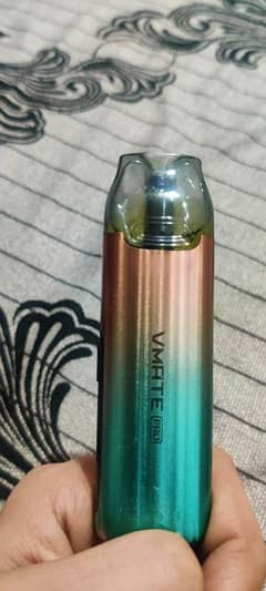 vmate pro pod with new coil and bottle of flavour