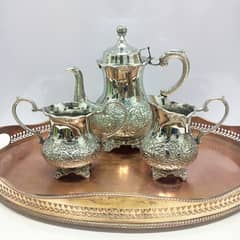 Vintage Silver-Plated Tea Set with Elegant Curves & Intricate Detail