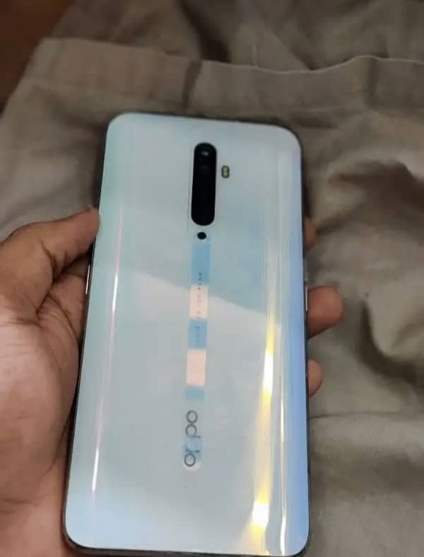 Oppo Reno 2f       exchnge iphone 11  xr 1