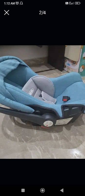 Baby Care Carry Cot and Car Seat 1