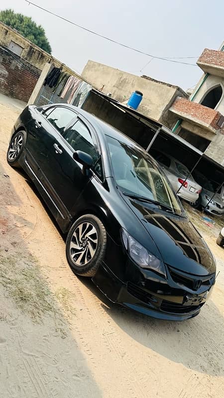 Honda reborn2008 auto lahore reg first owner minor touch seal packed 1