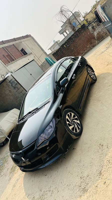 Honda reborn2008 auto lahore reg first owner minor touch seal packed 4