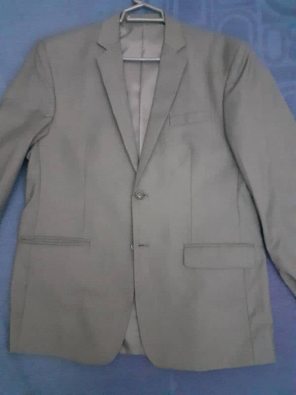 Branded two piece suit ( negotiable price ) 0