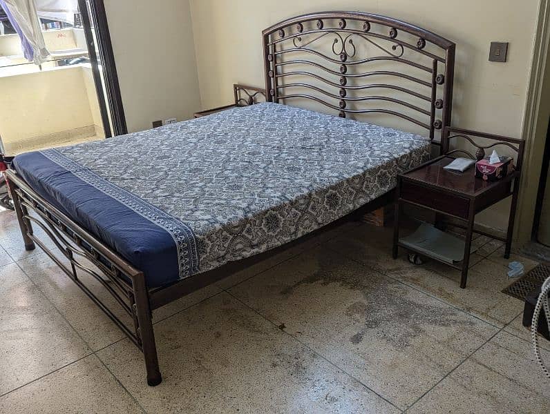 Rod Iron Queen Size Bed with side tables and spring mattress 0