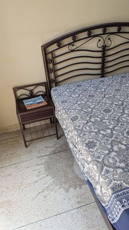 Rod Iron Queen Size Bed with side tables and spring mattress 1