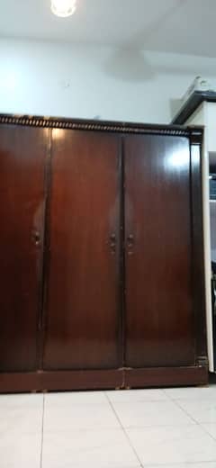 3 door wooden cupboard