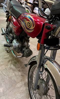 Dhoom bike urgent sale red color lush condition fuel efficiency