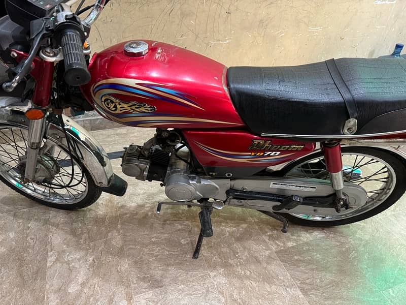 Dhoom bike urgent sale red color lush condition fuel efficiency 6