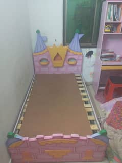 2 single Kidz bed without mattress with 1 sidetable