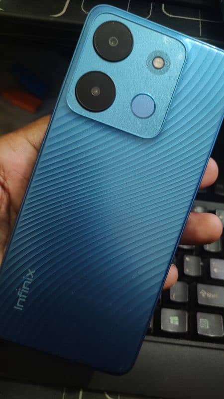 Smart 7 Blue Infinix 1