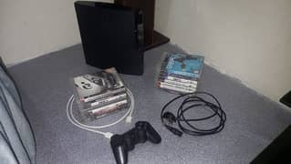 Play Station 3 with 1 controller and 14 game CDs