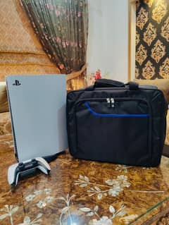 Sony Playstation 5 (PS5) with box, a controller and traveling bag