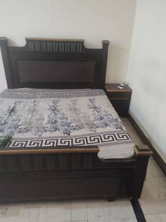 wooden double bed