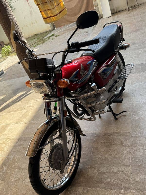 honda 125 fresh condition nowshera rajistar 5