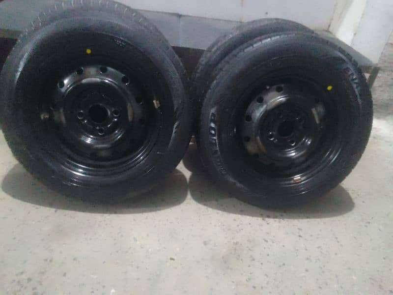 alto tyre and rims good condition 0