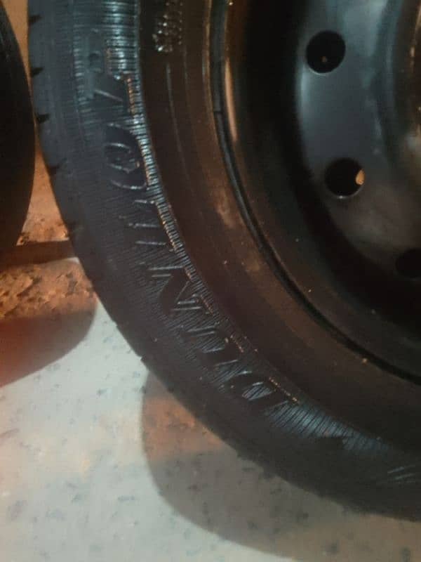 alto tyre and rims good condition 2