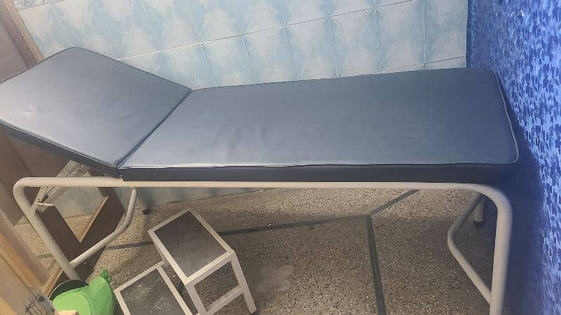 All clinical equipment for sale. couch, dr table, reception table, etc 16