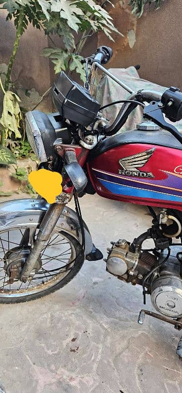 honda cd 70 red 2007 karachi number 10