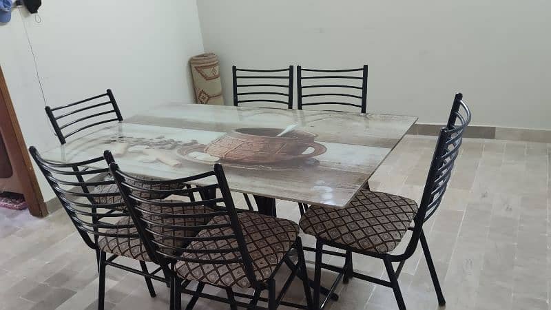 dinning table with 6 chairs for gd condition 2