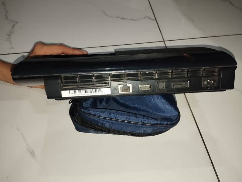 PS3 slim with 3 controllers 4