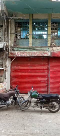 Tariq road shop 300 feet ground+ 270 feet mazanine