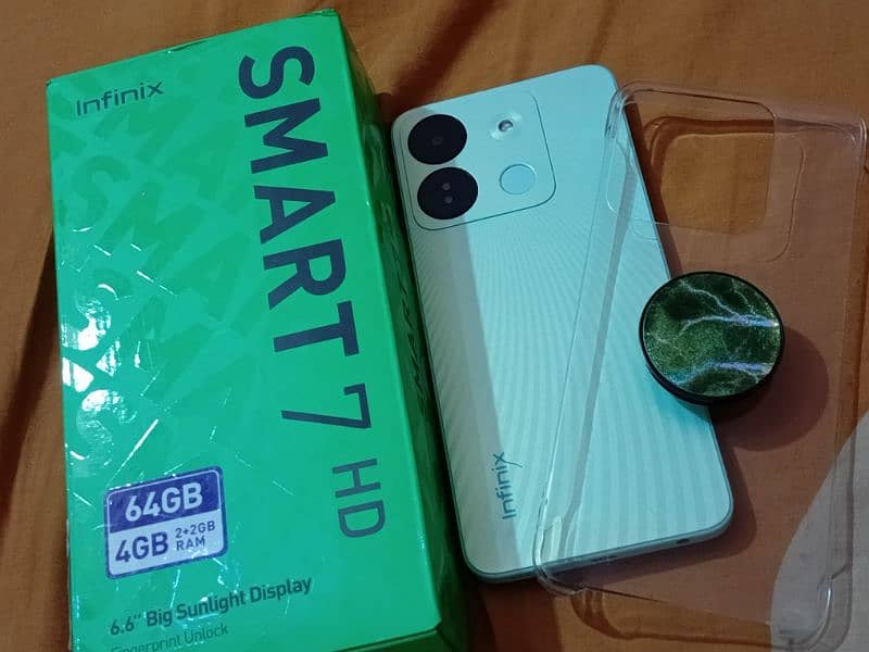 Infinix smart 7 HD 4/64 gb with box and warranty PTA approved mobile 2