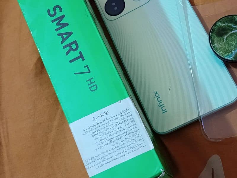 Infinix smart 7 HD 4/64 gb with box and warranty PTA approved mobile 10