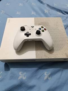 Xbox 1 s with one controller and 3 games