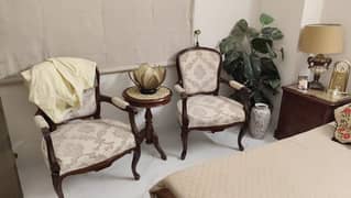 Victorian style chair with coffee table