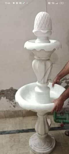 Good condition marble fountain and 1/2 cusic pump.