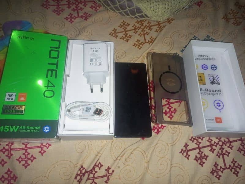 Infinix Note 40. one month use only all accessories box. 8+8/256. 8