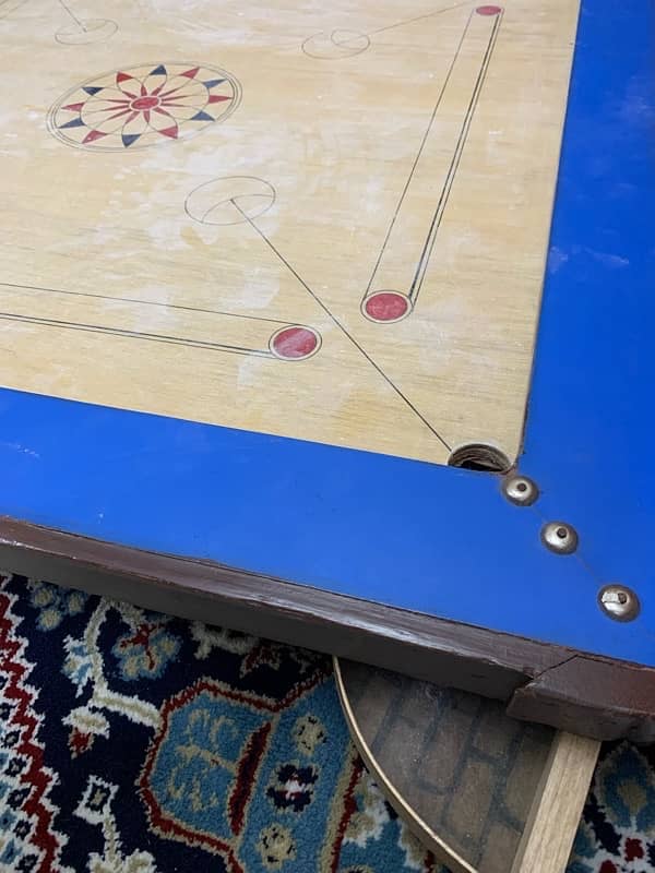 carrom board excellent wood material . 10/10 condition . 3