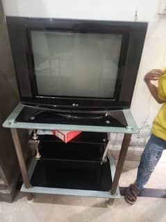 LG flat screen TV with trolley