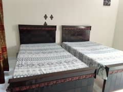 2 Single Wooden Bed