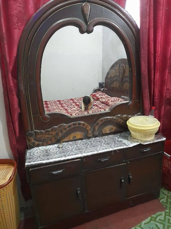 I am selling for Bed/Dressing and Crockery cabinet 7