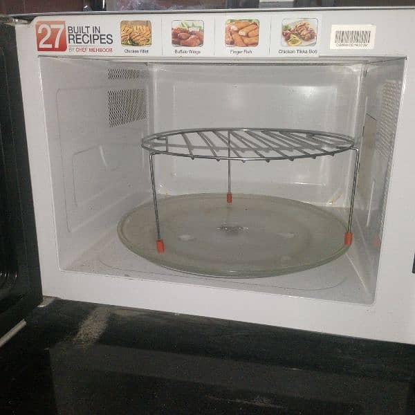 I am selling my microwave oven in a one condition 1