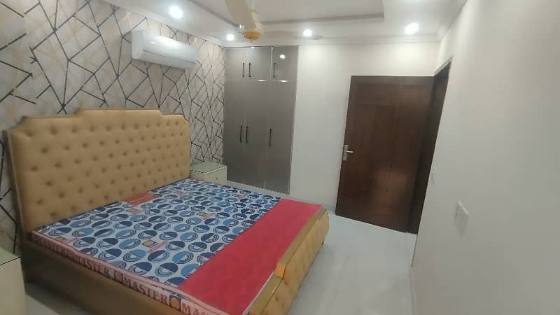 2 BEDROOM FULLY LUXURY FURNISH IDEAL LOCATION EXCELLENT FLAT FOR RENT IN SECTOR C BAHRIA TOWN LAHORE 15