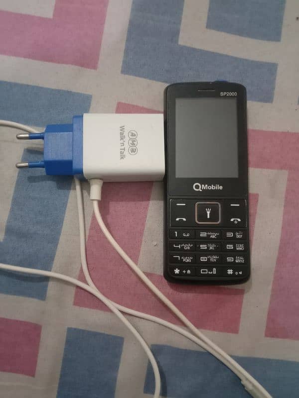 Q Mobile sp 2000 1