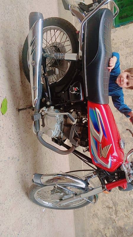 honda 125 red km 20000 lahore number 0